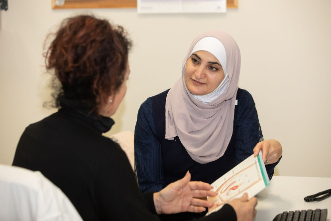 Woman talking to clinician