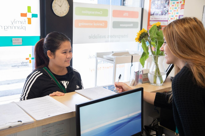 Woman making an appointment